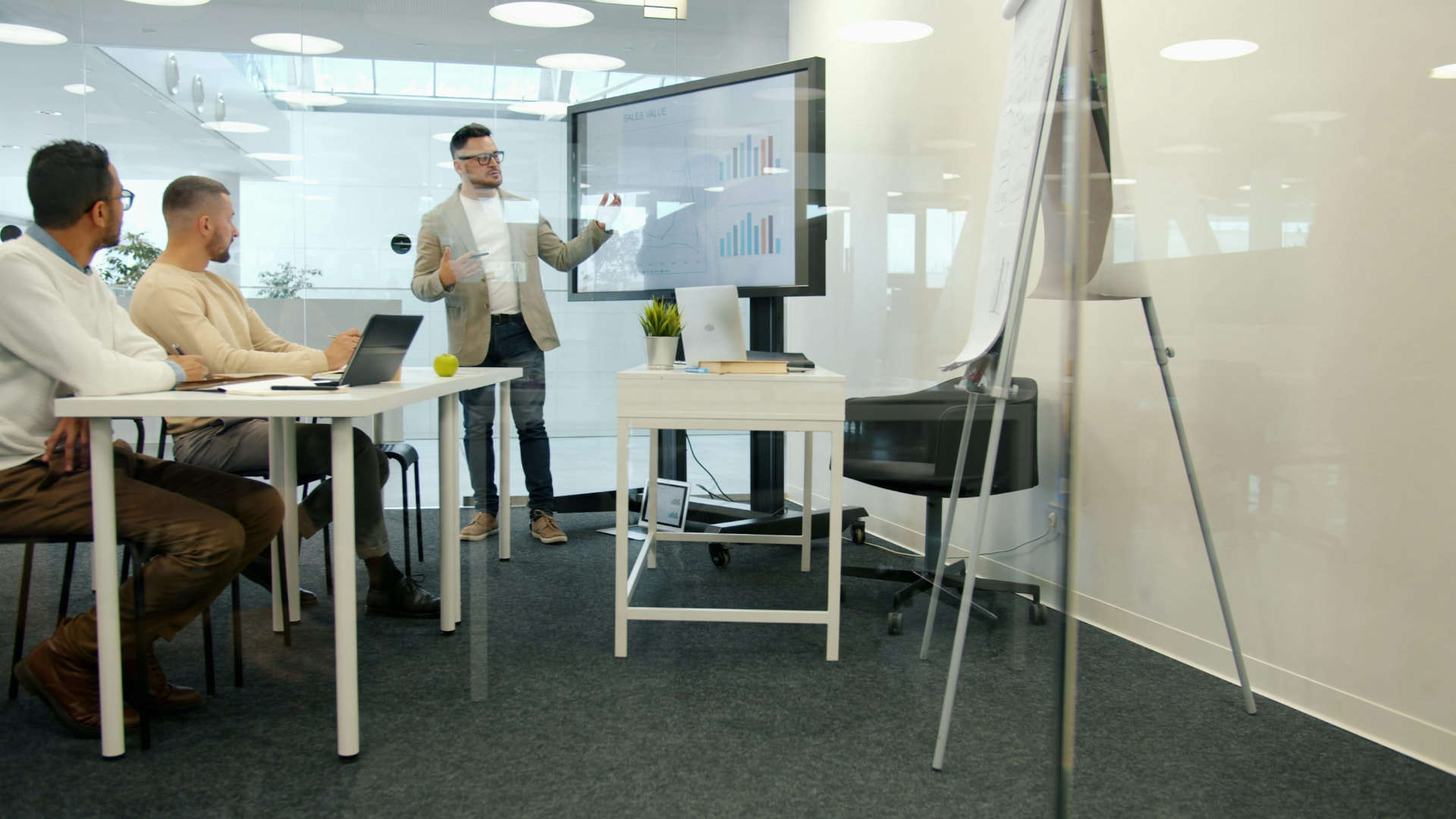 Executives in a boardroom meeting discussing a decision